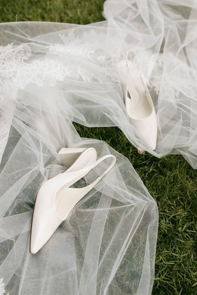 Bride details showing shoes and veil at a wedding at Tyler Gardens in Bucks County, PA