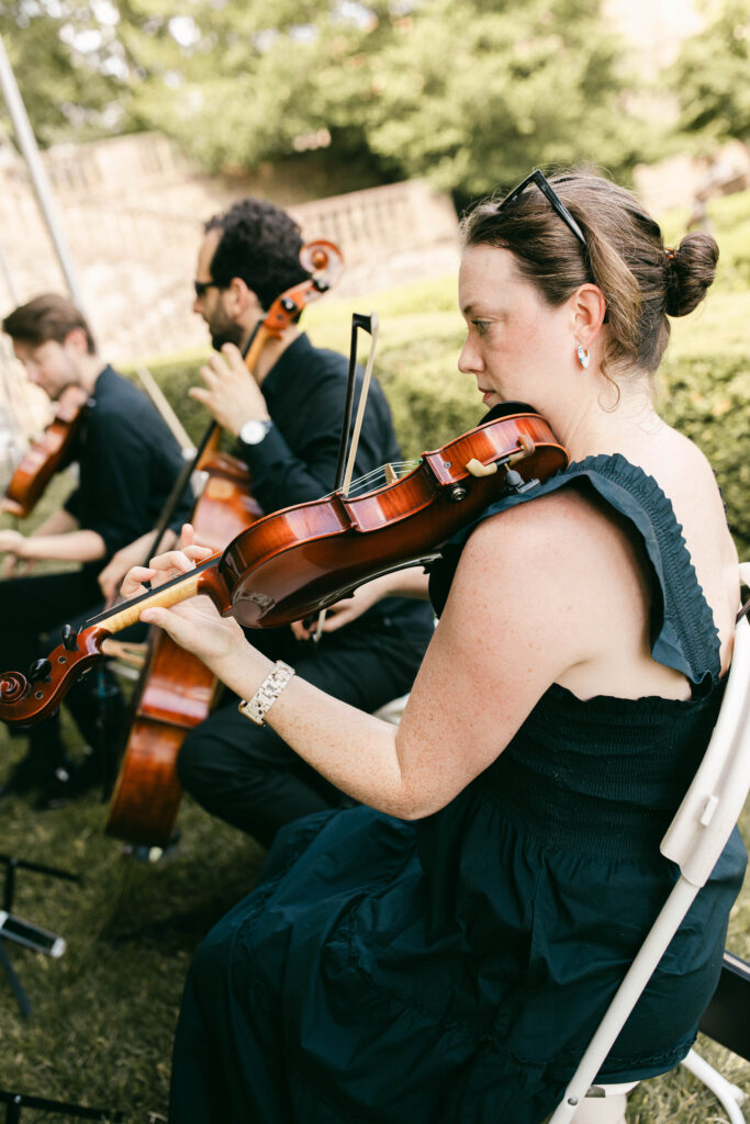 A string quartet plays as the bride prepares to walk down the aisle at Tyler Gardens in Bucks County, PA