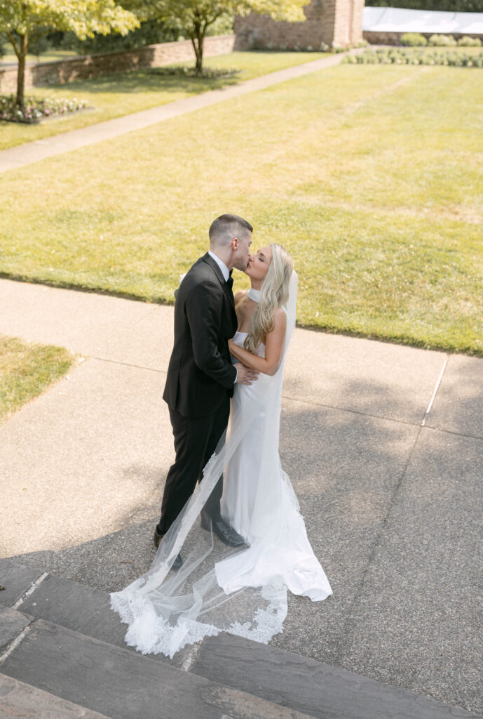 the bride and groom share a kiss after becoming husband and wife